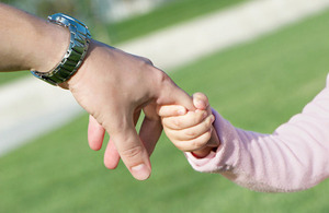 s300_TS100517467_-_Tiny_hand_holding_an_adult_s_hand_0