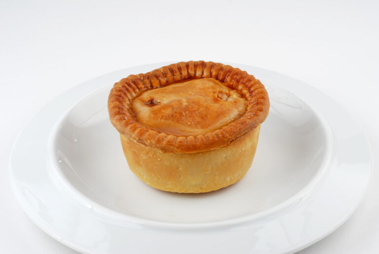 Pork_pie_on_plate_0