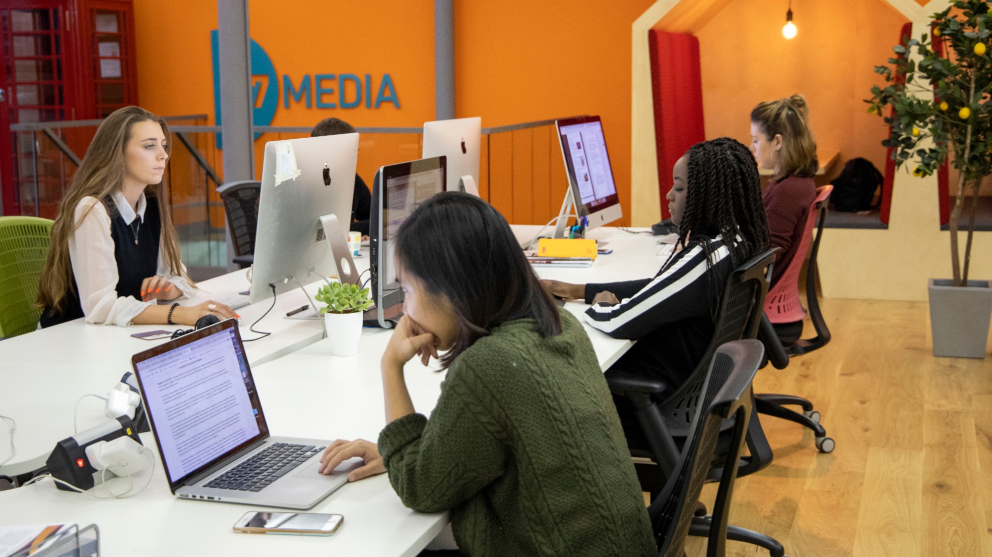 k7_medias_vibrant_communal_office_working_space
