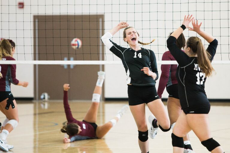 Women playing volleyball