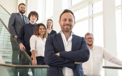 Aaron Crewe (front) and the Novi team