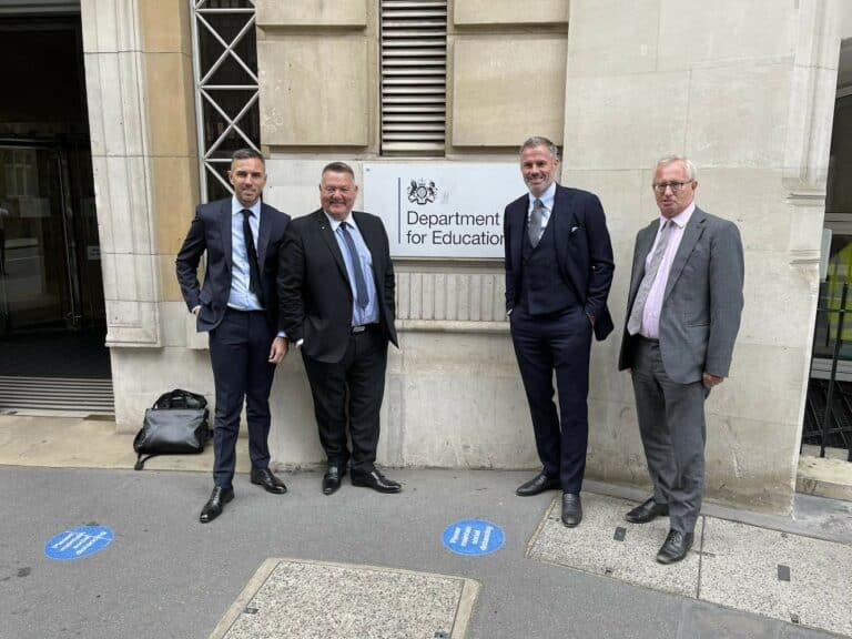 l-r: Dan Hughes with Mark King, Jamie Carragher and Lord Stuart Polak