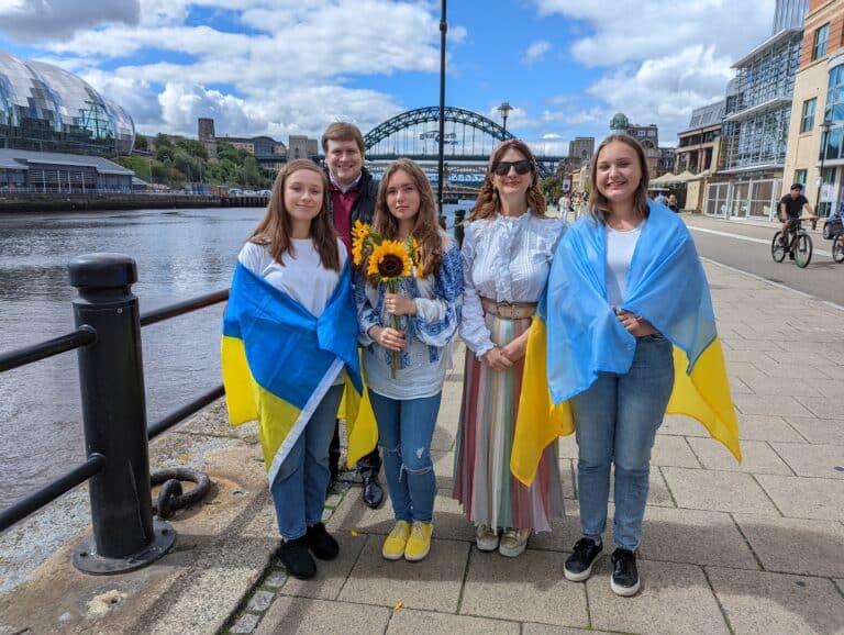 Choir of Ukrainian Newcastle residents at the quayside