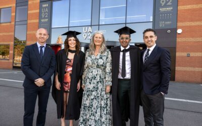 Nicky Butt and Gary Neville with graduates of UA92