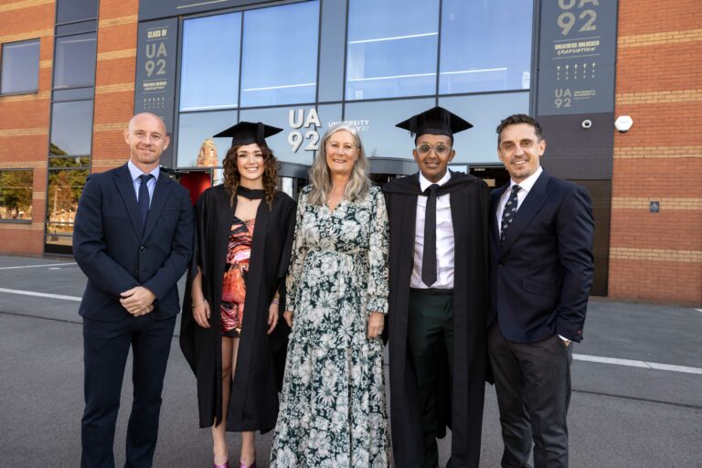 Nicky Butt and Gary Neville with graduates of UA92