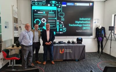 Dave Spencer, Michael Thompson (both IDTC) and ZEST I/'s Zeynel Badak in the IDTC lab