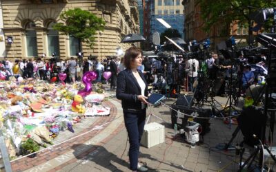 Global media cover the floral tribute to the arena bombings victims. Ardfern/Creative Commons