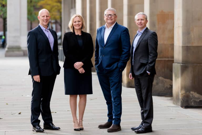 Grant Peggie, 2nd from right, and colleagues
