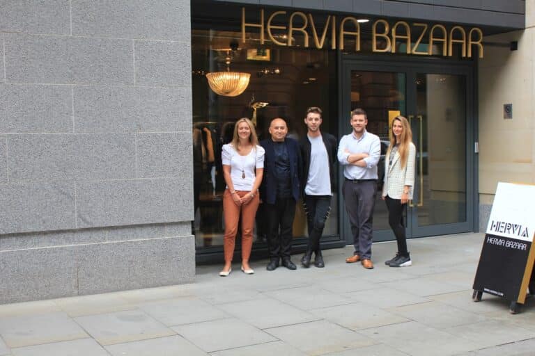 Hervia Bazaar, with Oscar Pinto-Hervia second left