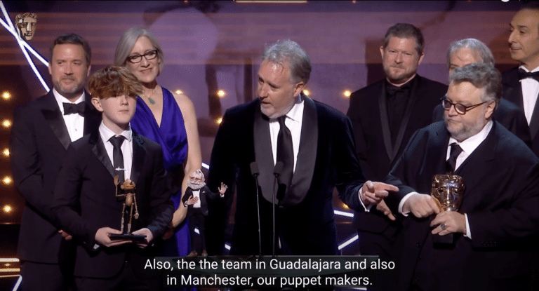 Gustafson, speaking, and del Toro, right, at the BAFTAs. BAFTA/YouTube