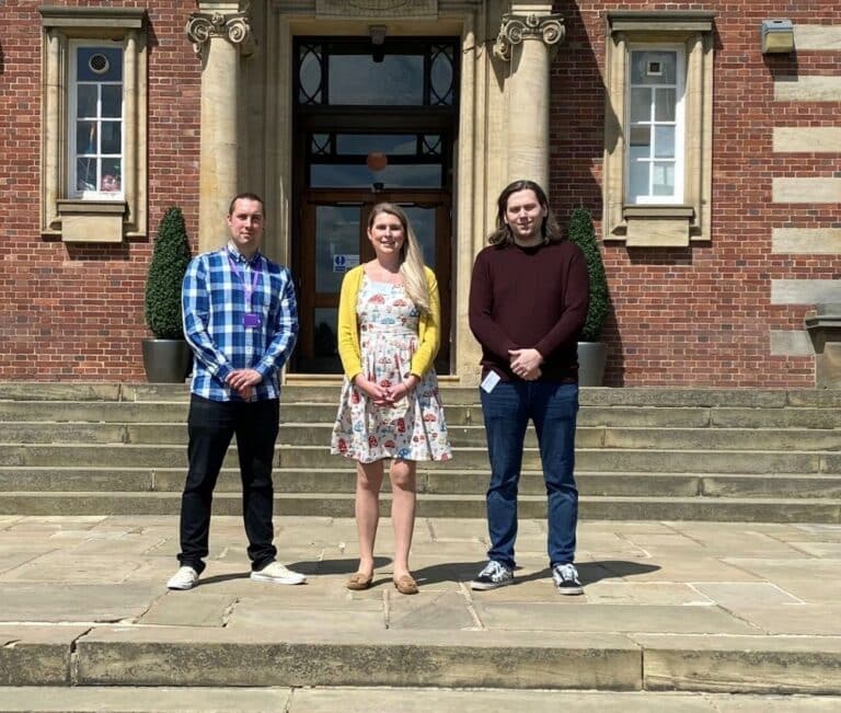 Leeds Beckett's Mike Hall with Frame's Hannah Bratley and Liam Fulton